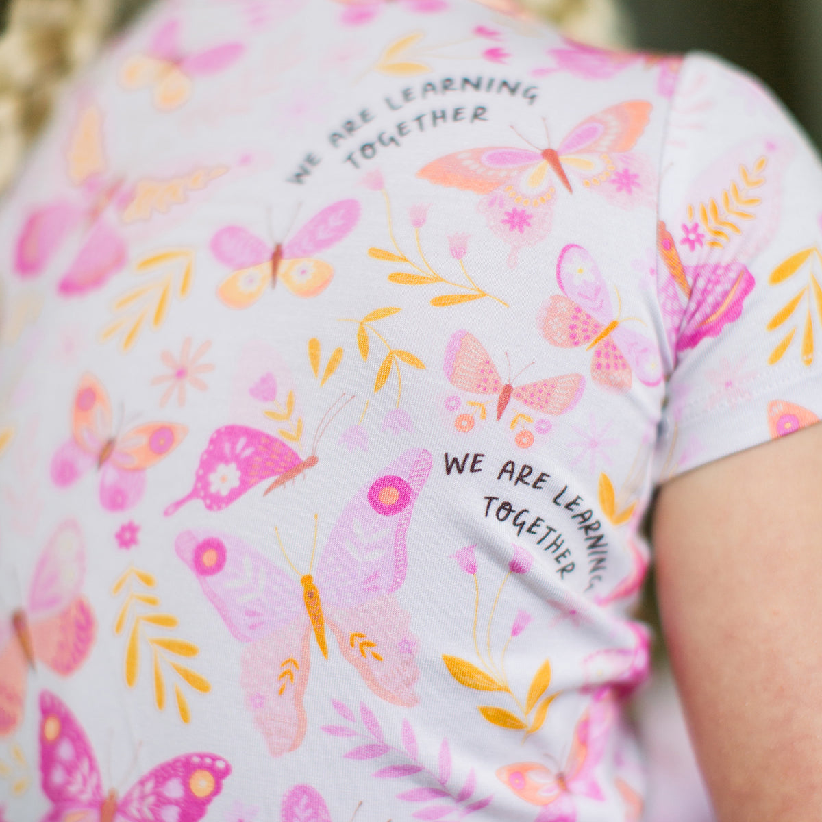 Baby wearing butterfly print bamboo pajamas from the Butterfly Smoochies collection