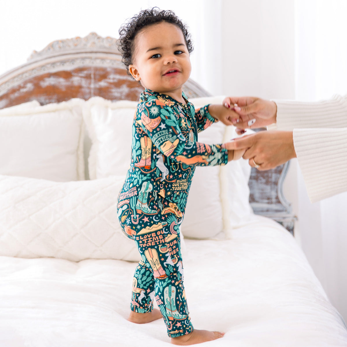 Toddler wearing footless bamboo romper built for play