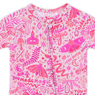 Pink and white baby onesie with magical design and text.